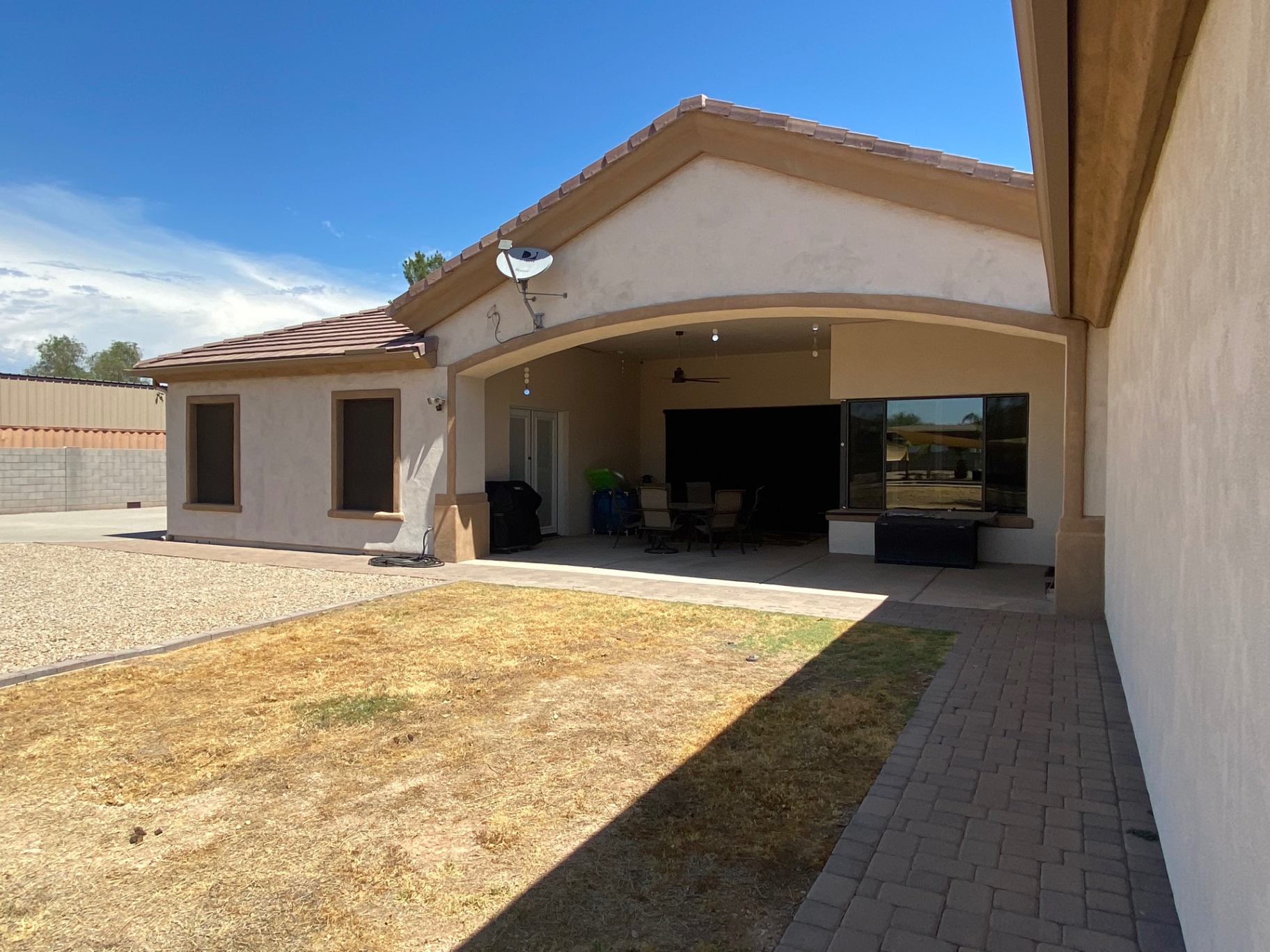 Aurora Estate — back patio and lawn before pavilion build