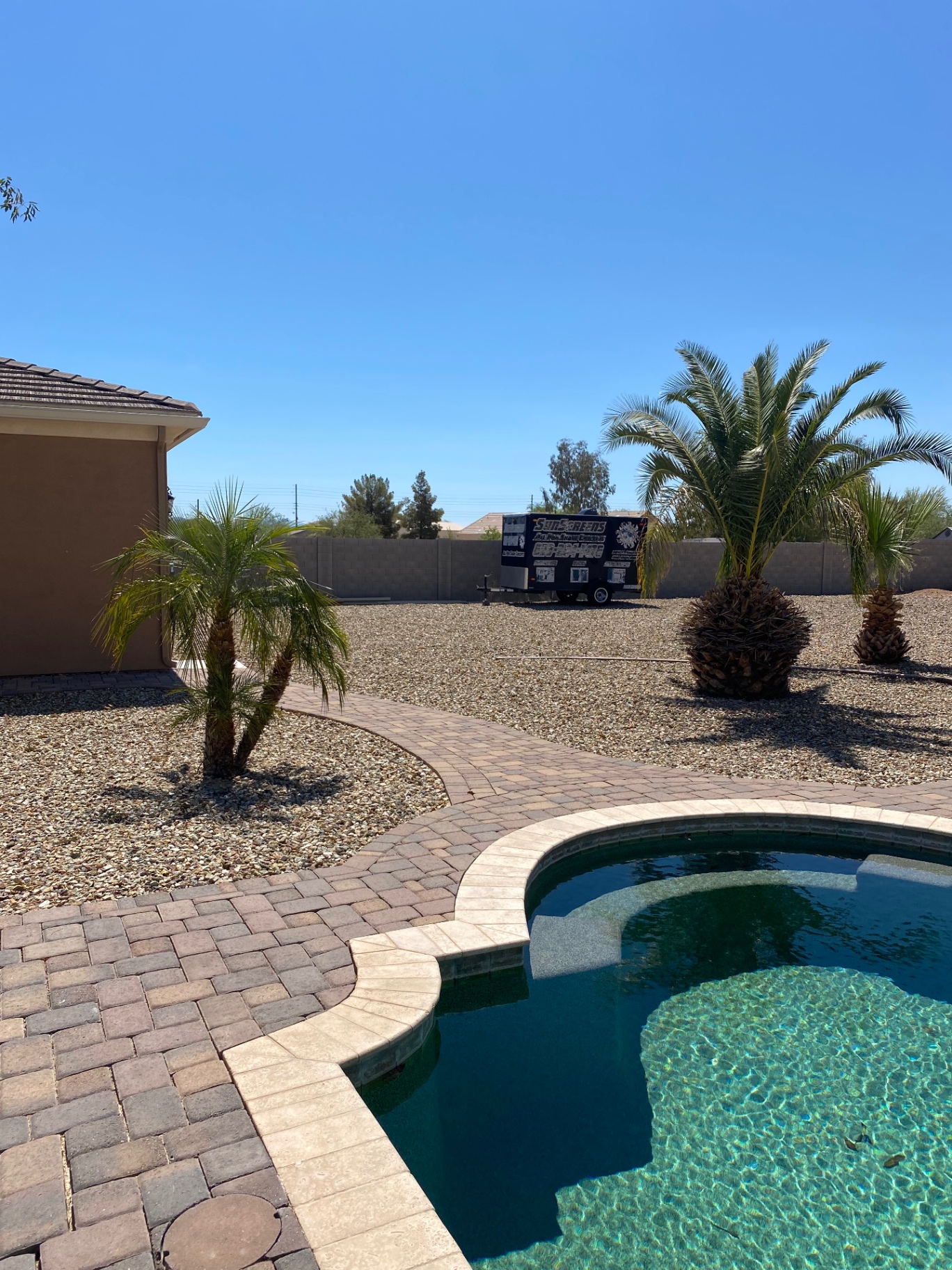 Aurora Estate — original spa and paver path before water-feature build