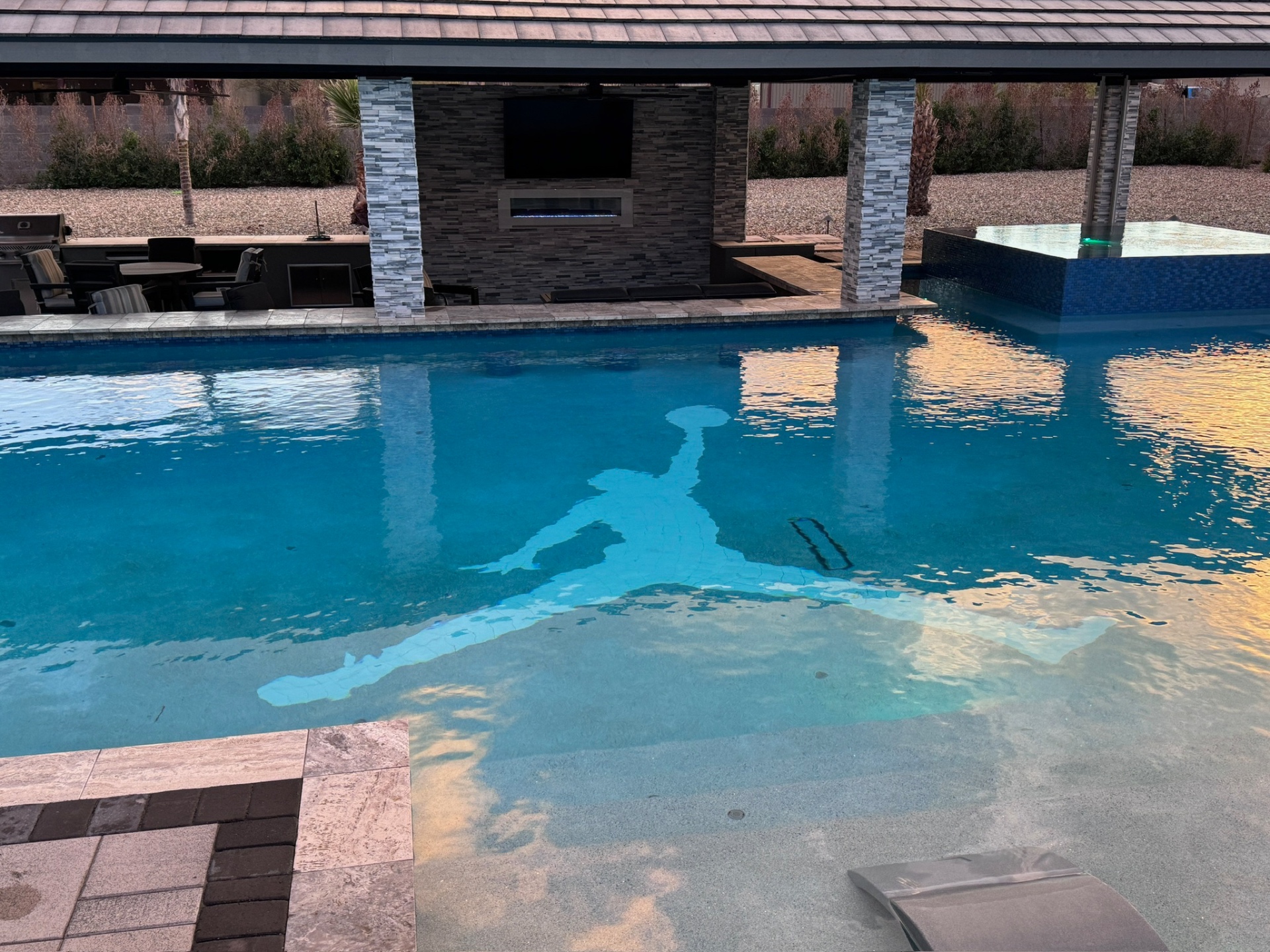 Aurora Estate — custom Jumpman silhouette mosaic inlay on pool floor
